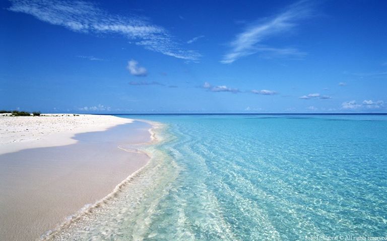 Comporta On the Alentejo coast in Portugal, a beach with white sand and a blue sea, simply paradise